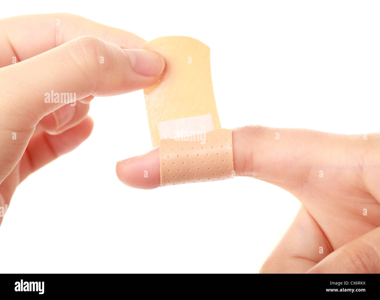 Closeup of of woman's hands with band-aid, on white background Stock Photo