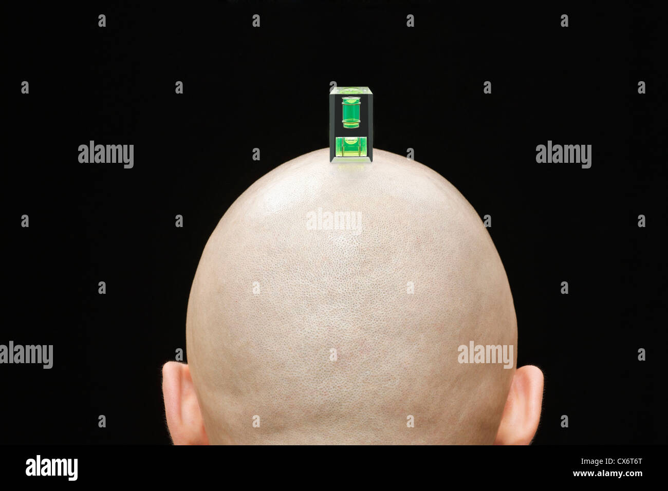 A camera spirit level on the head of a man, rear view Stock Photo