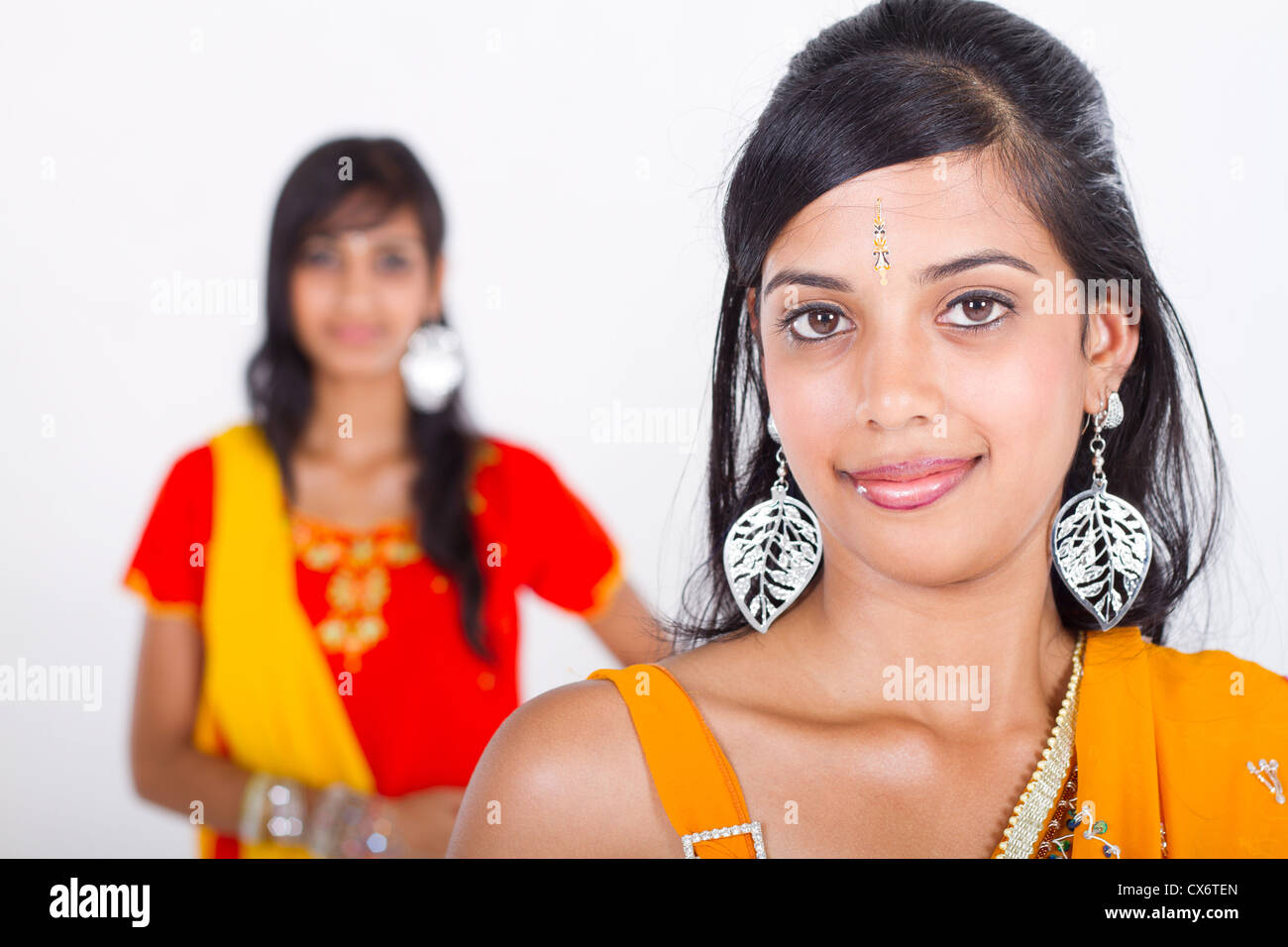 https://c8.alamy.com/comp/CX6TEN/two-indian-young-woman-closeup-CX6TEN.jpg