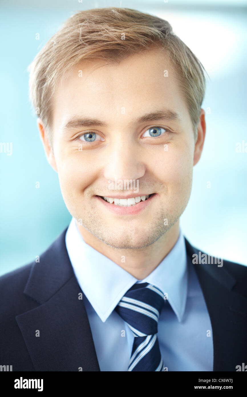 Portrait of cheerful businessman looking at camera Stock Photo - Alamy