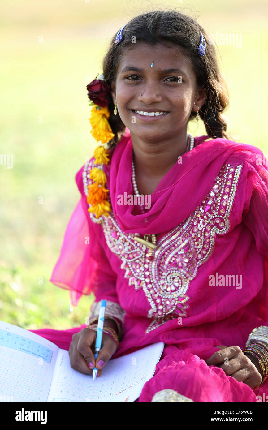 Indian girl writing in her notebook Andhra Pradesh South India Stock ...