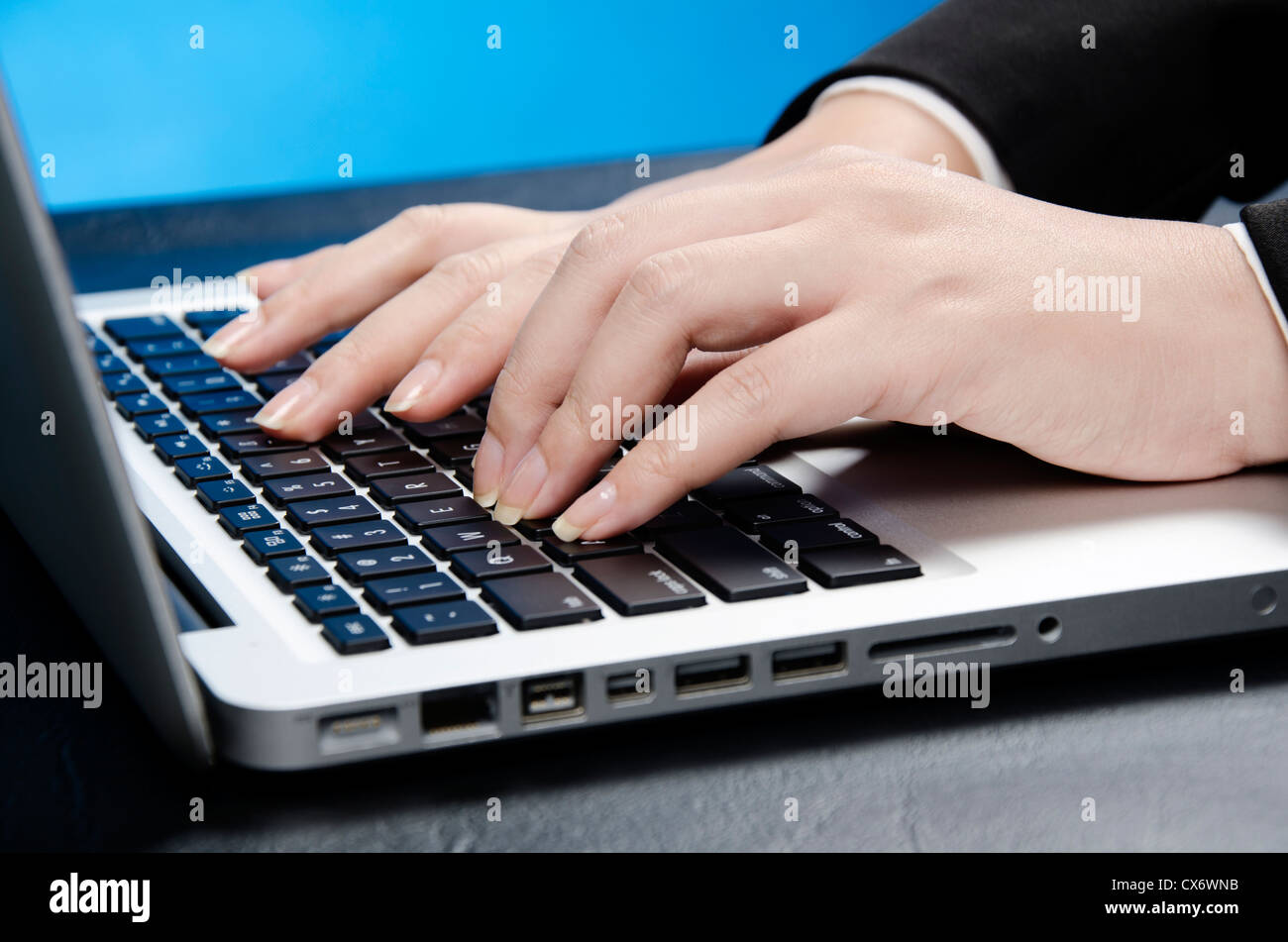 touching keyboard Stock Photo