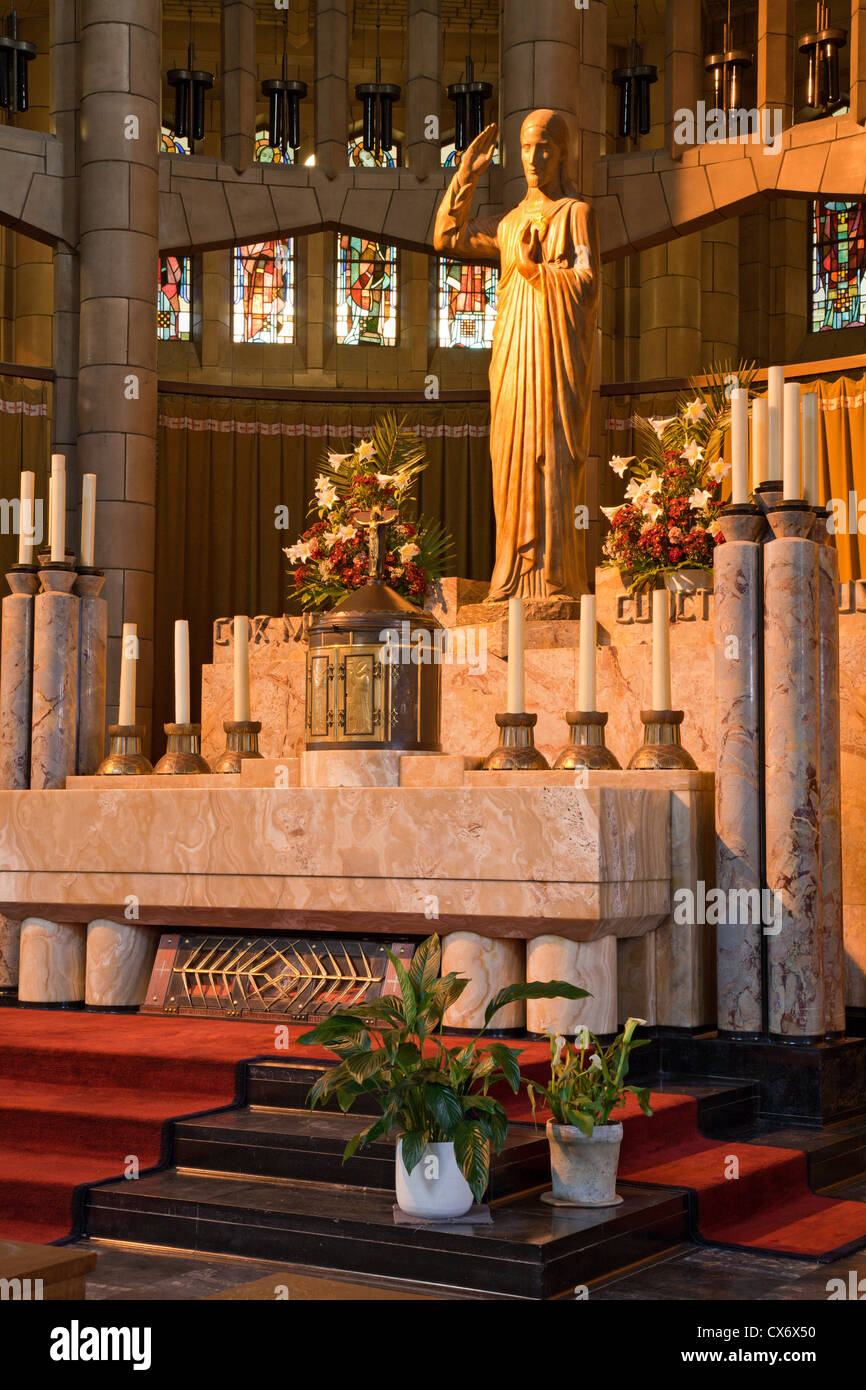 BRUSSELS - JUNE 22: Main altar with the statue of Christ from National Basilica of the Sacred Heart on June 22, 2012 in Brussel Stock Photo