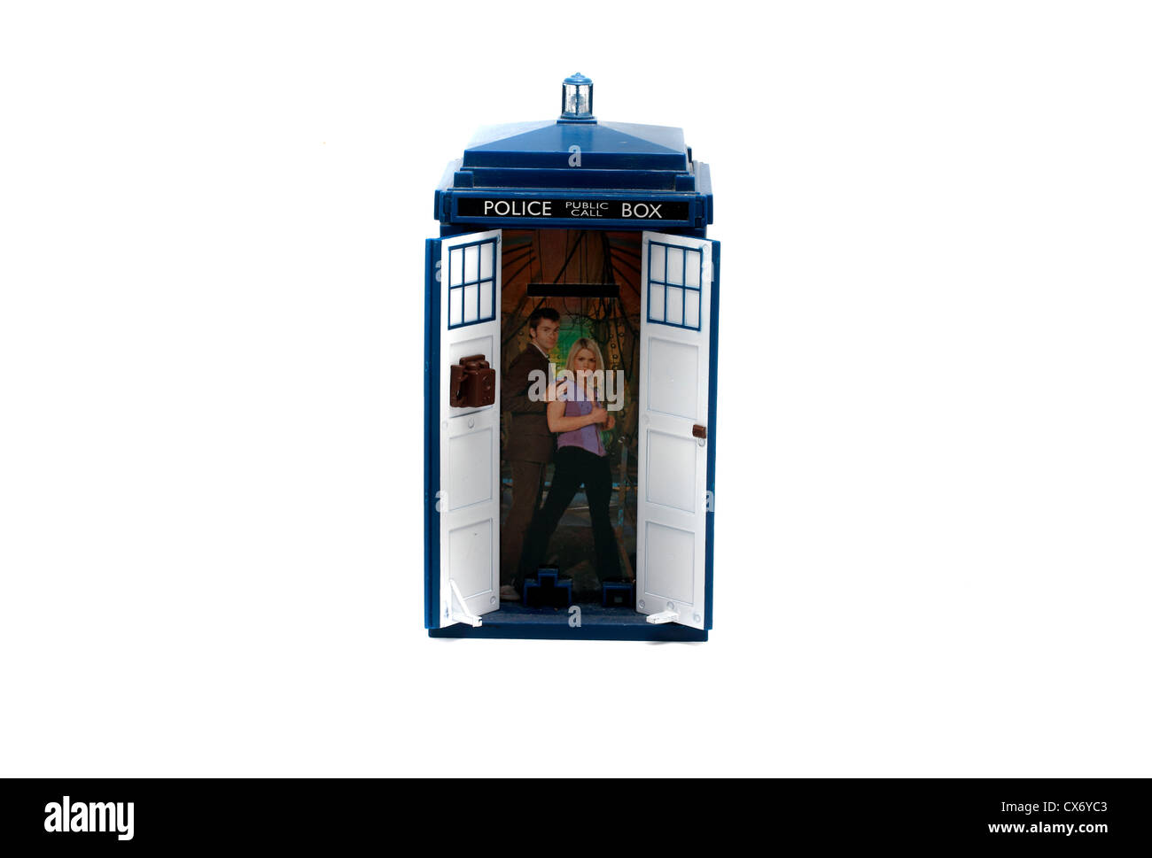 Tardis Money box, for the dedicated young Whovian 17cms tall, 9 cms across  the base. battery operated light and tardis engine noise. Doors open up to  reveal David Tennant Doctor and Rose
