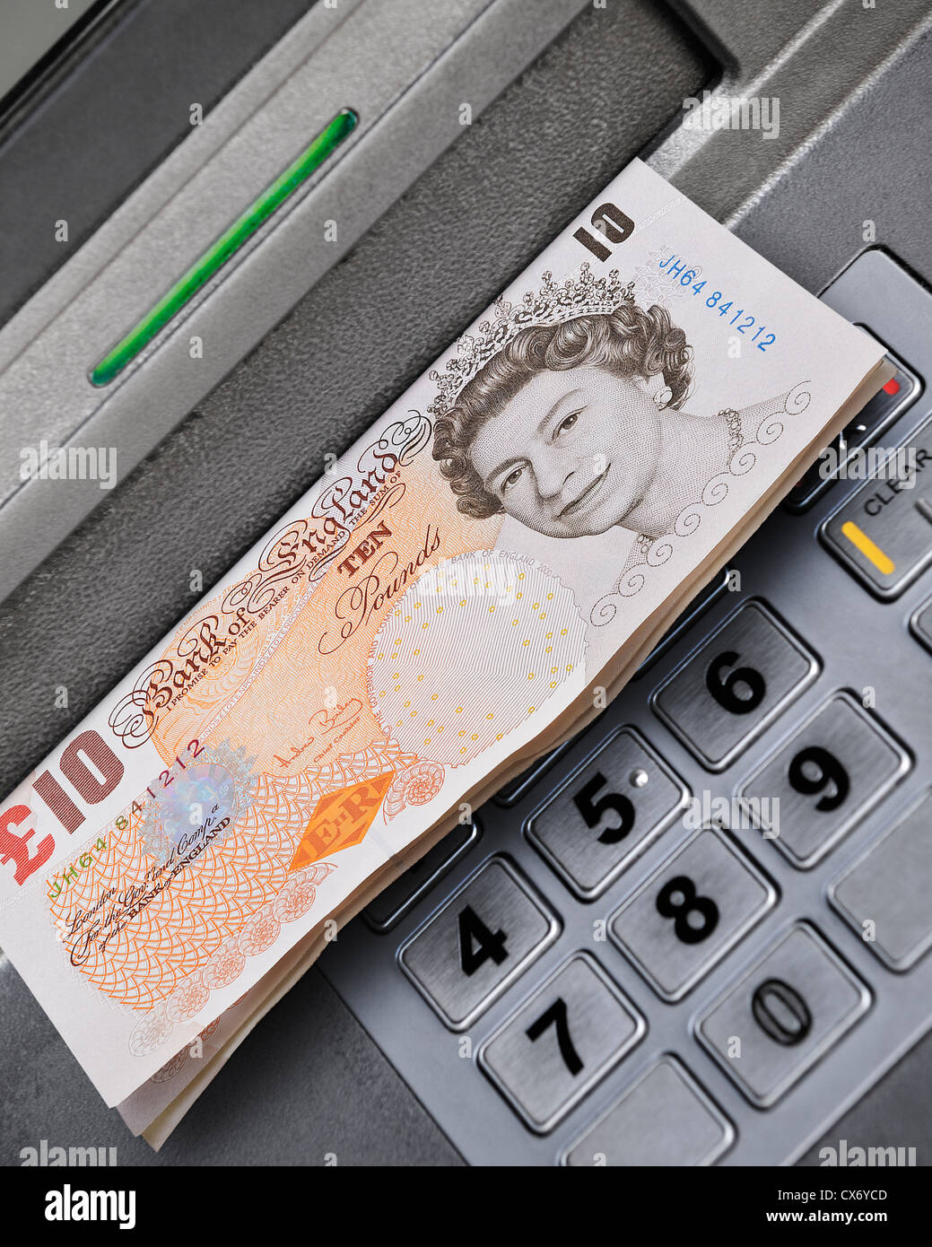 Cashpoint Dispensing Cash, UK. Stock Photo