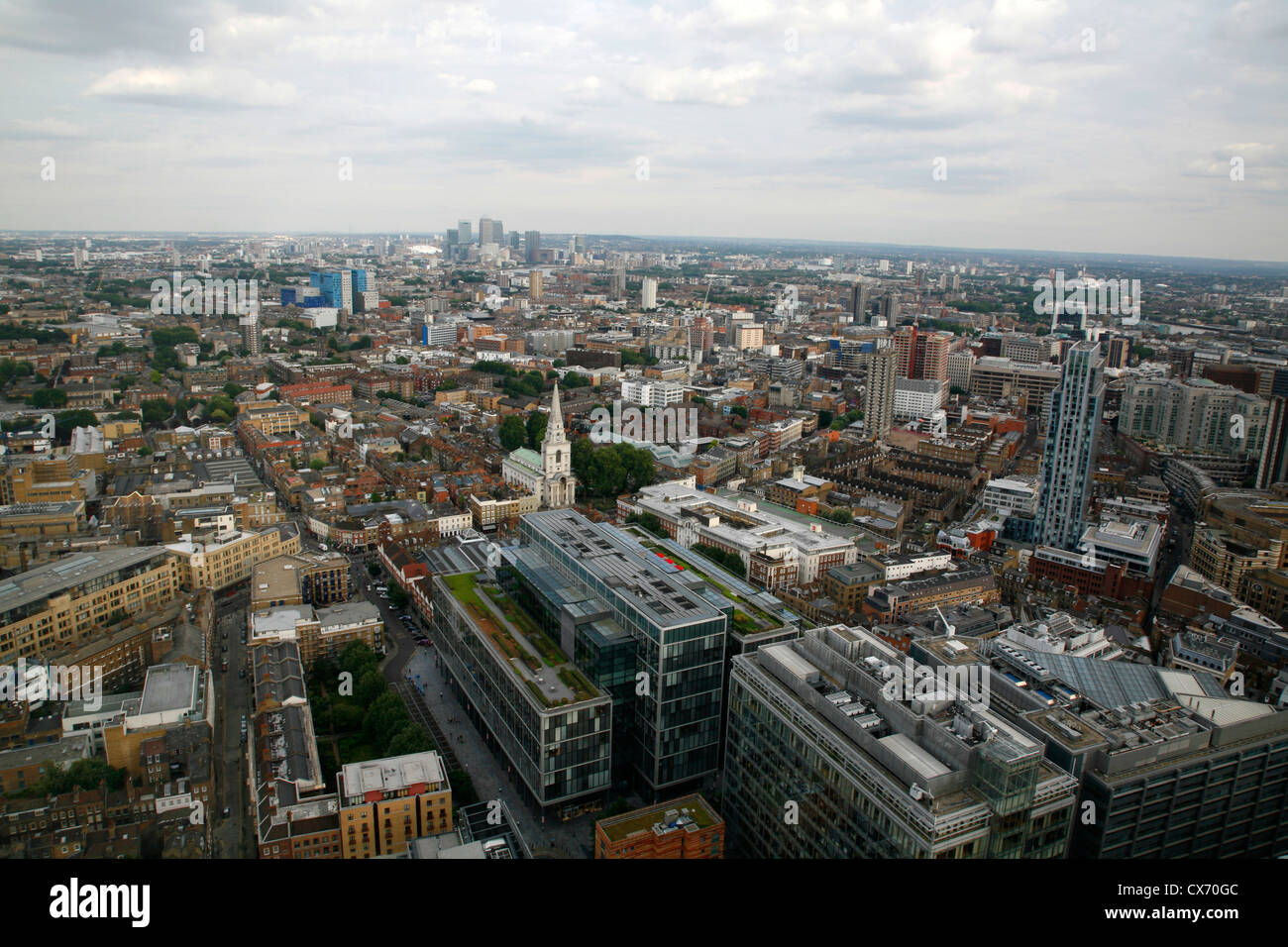 Elevated view looking down on to Spitalfields and further east towards Whitechapel and Canary Wharf, London, UK Stock Photo