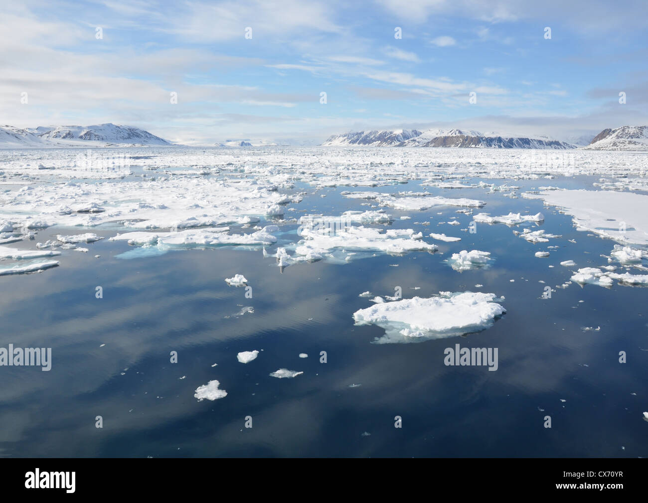 Icy waters around the coast of Sptsbergen, Svalbard in the Arctic Ocean. Stock Photo