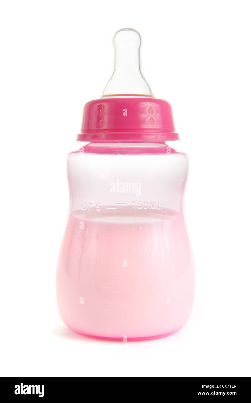 Pink babies bottle half full of milk on white Stock Photo Alamy