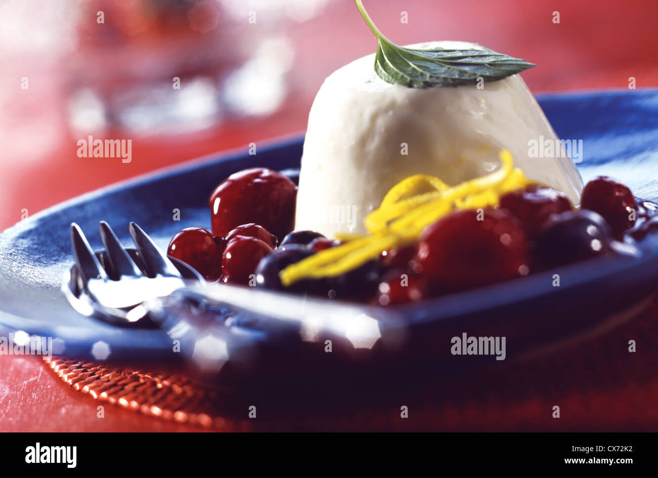 Buttermilk mousse with red fruit jelly Stock Photo Alamy