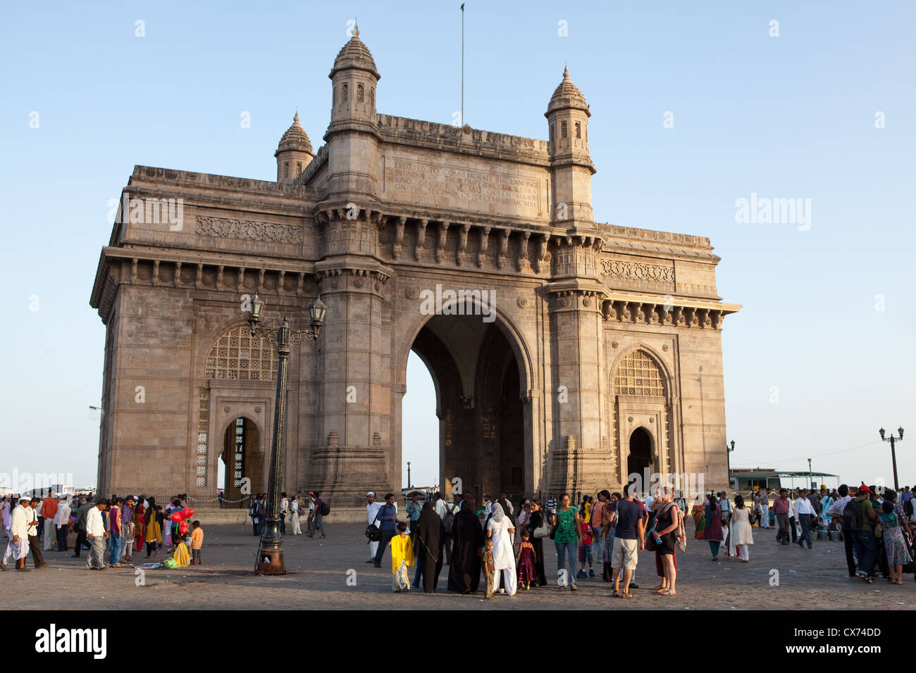 Tourists in front of the Gateway of India in Colaba, Mumbai Stock Photo