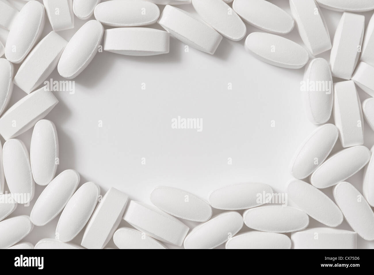 PILLS SUPPLEMENTS DRUGS White on a white background Space for Copy landscape- Concept Stock Photo