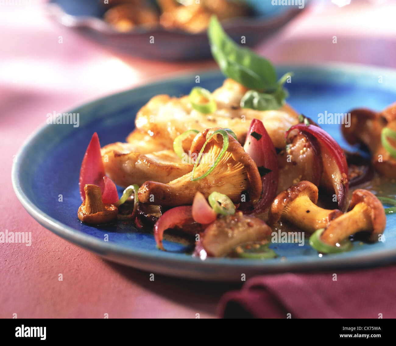 Fillet of monkfish with mustard sauce and chanterelles Stock Photo Alamy