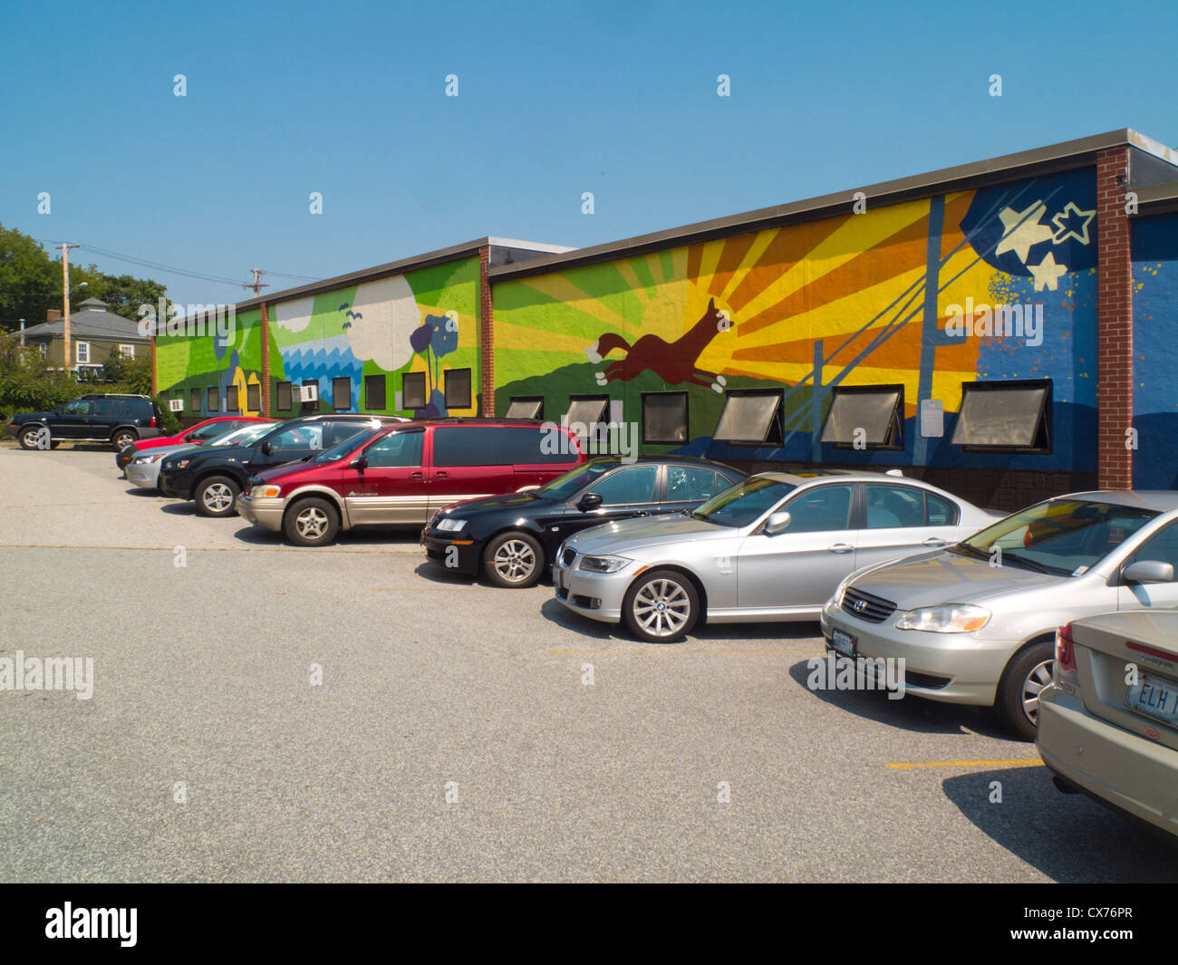Mural on the side of a school building Stock Photo - Alamy