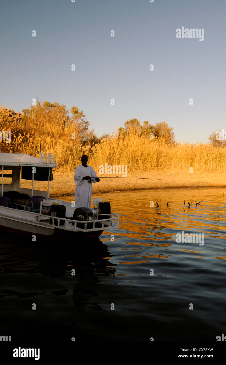Fishing boat on river fisherman hi-res stock photography and images - Alamy