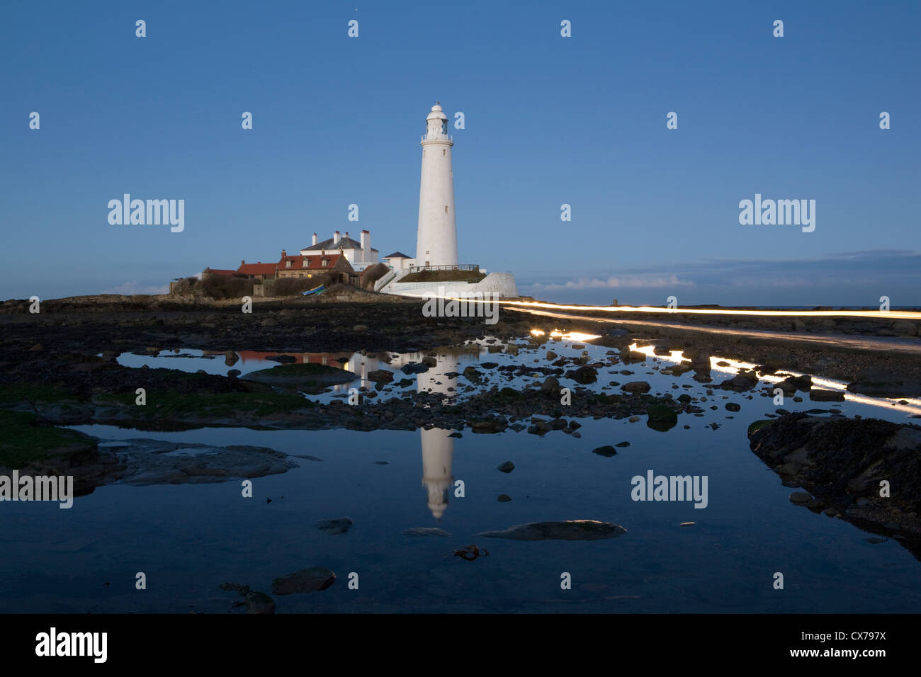 A car crosses the causeway at St Mary's Lighthouse, near Whitley Bay, Tyne & Wear Stock Photo