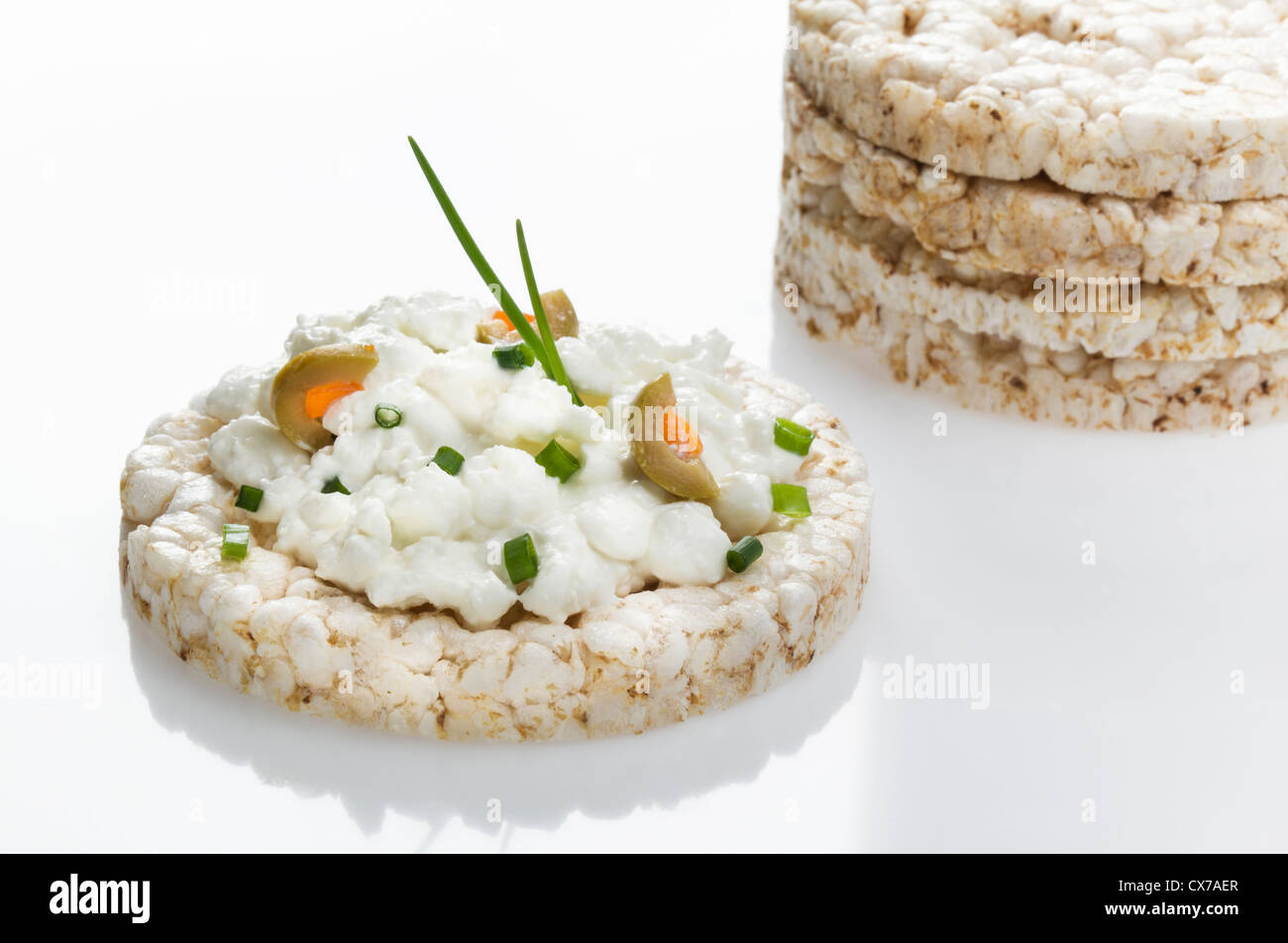 round Rice Cake topped with Cottage Cheese Stock Photo