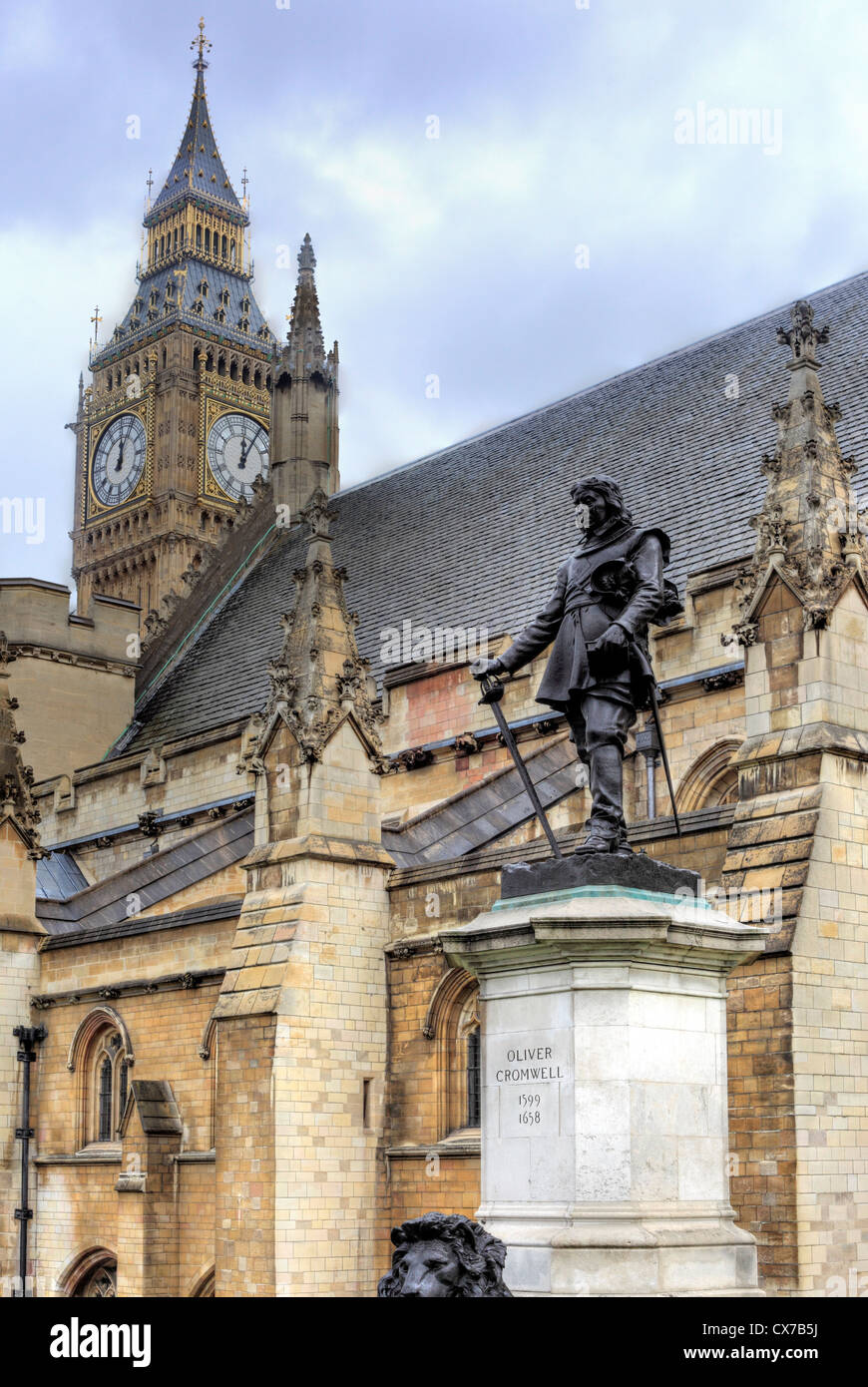 Statue of Oliver Cromwell, Old Palace Yard and the Palace of Westminster, London, UK Stock Photo