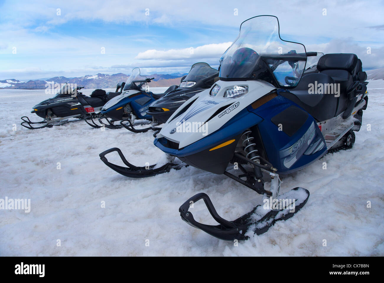 Snow mobiles (skidoos) on the Vatnajökull Glacier, Iceland Stock Photo