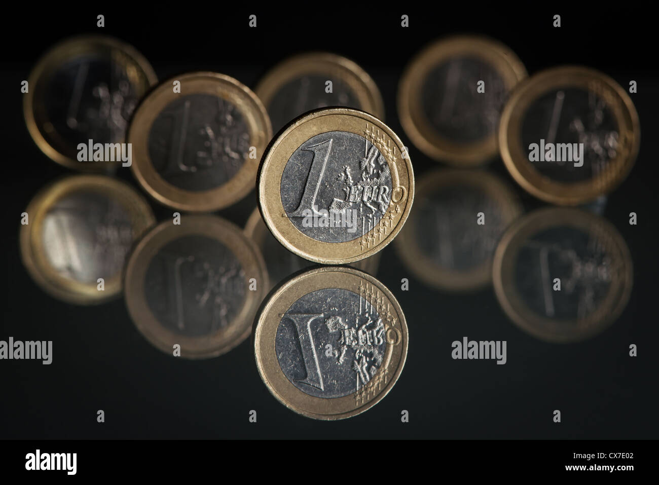 one euro coins on black background Stock Photo