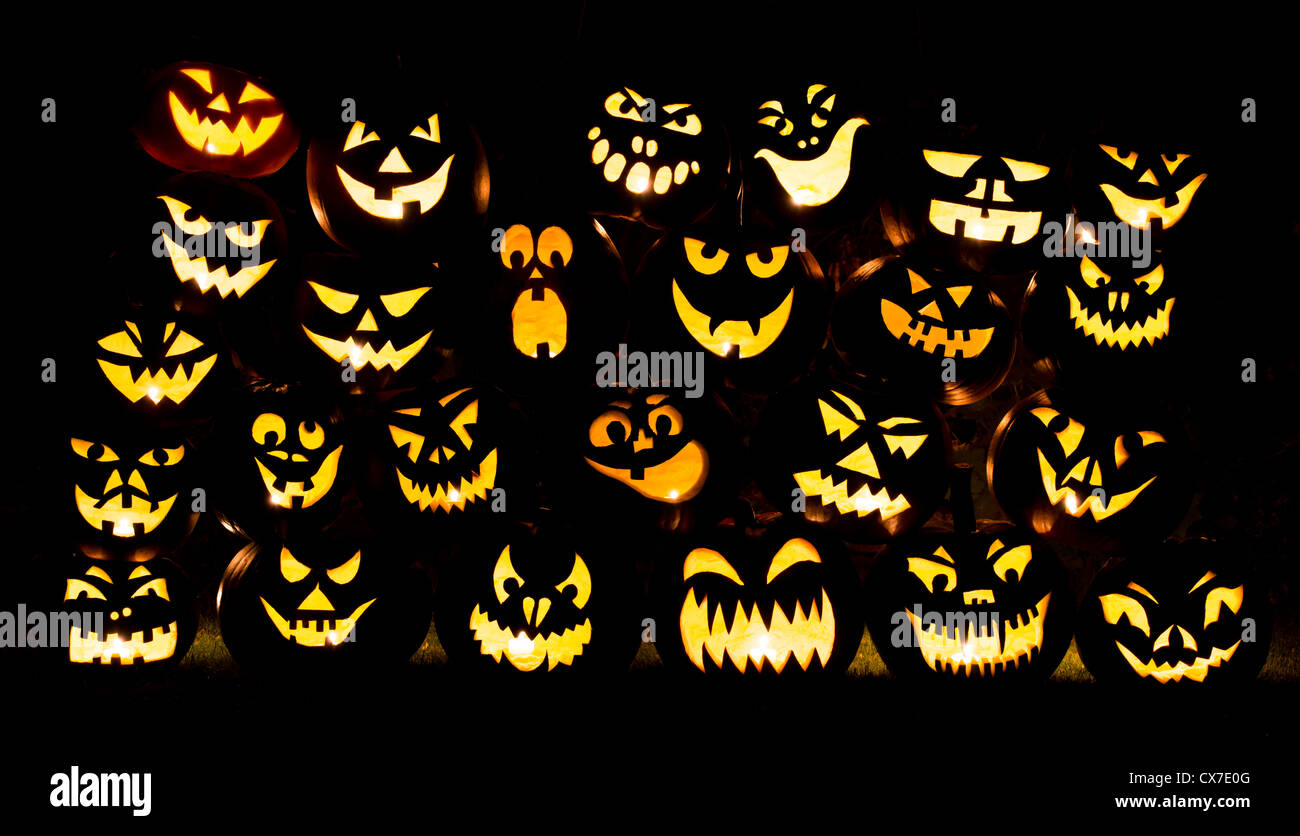 Halloween pumpkins. Jack o lantern faces at night Stock Photo - Alamy