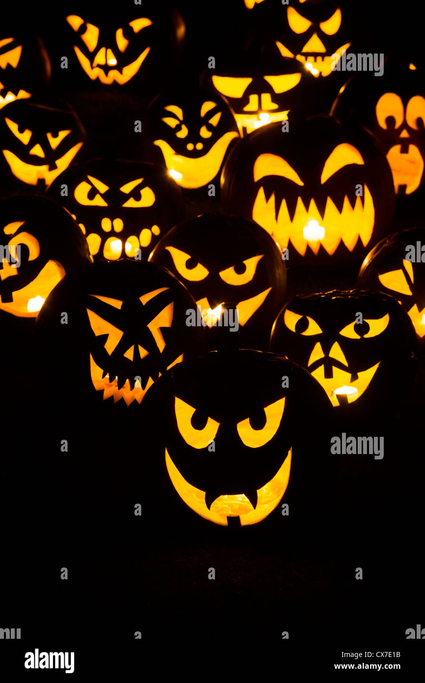 Halloween pumpkins. Jack o lantern faces at night Stock Photo - Alamy