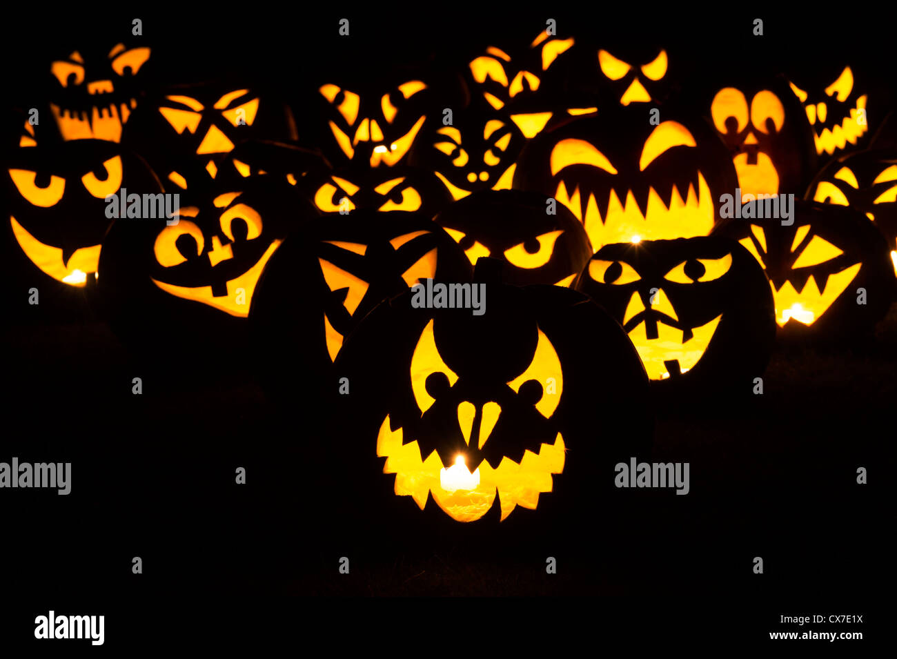 Halloween pumpkins. Jack o lantern faces at night Stock Photo - Alamy