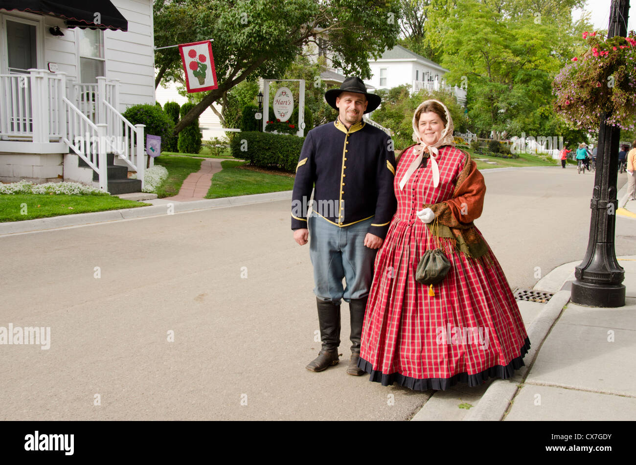 Michigan, Mackinac Island. Local couple in historic period attire. Stock Photo