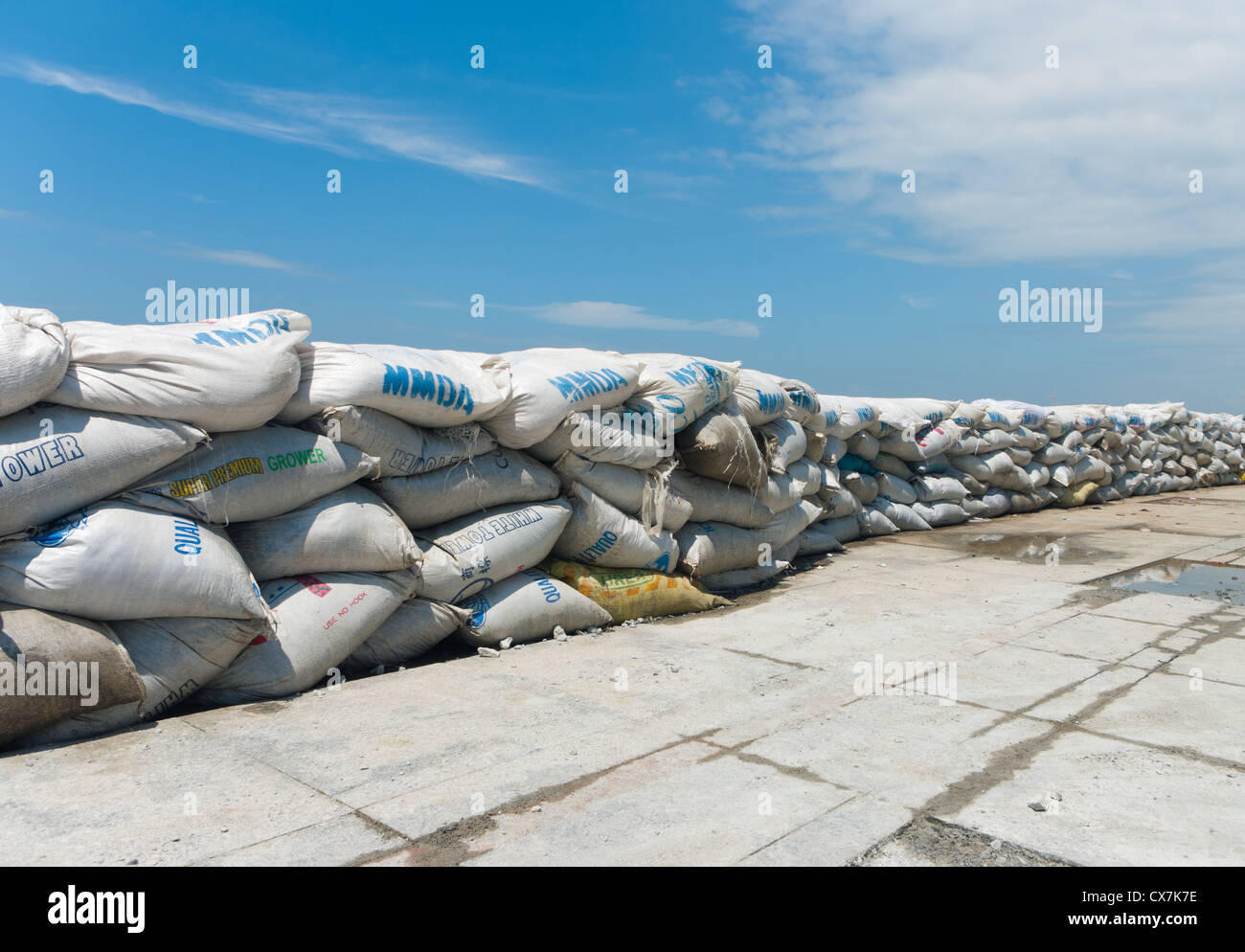 Wall of sandbags as protection for the powerful typhoon Nesat who struck the Philippines on September 30, 2011 Stock Photo
