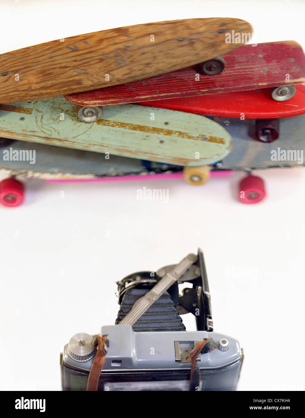 A large format camera and skateboards in a photo studio Stock Photo