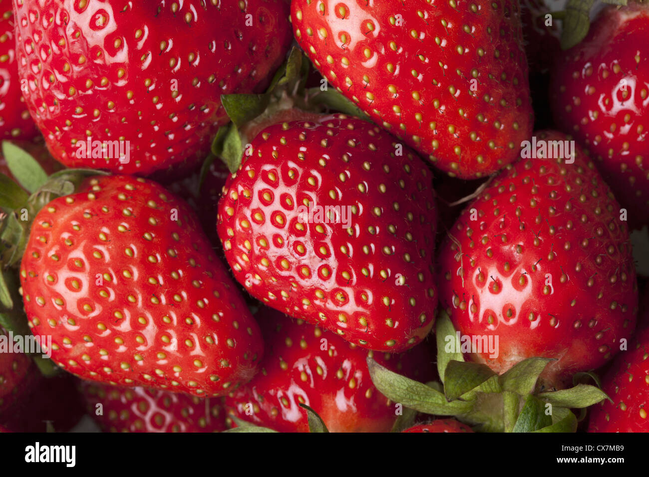 A heap of strawberries, full frame Stock Photo