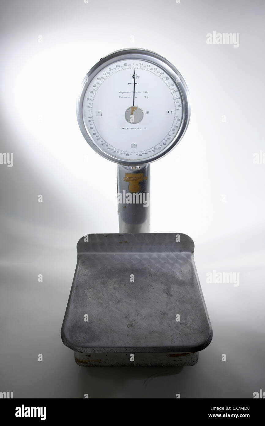 An old-fashioned, empty kitchen scale Stock Photo