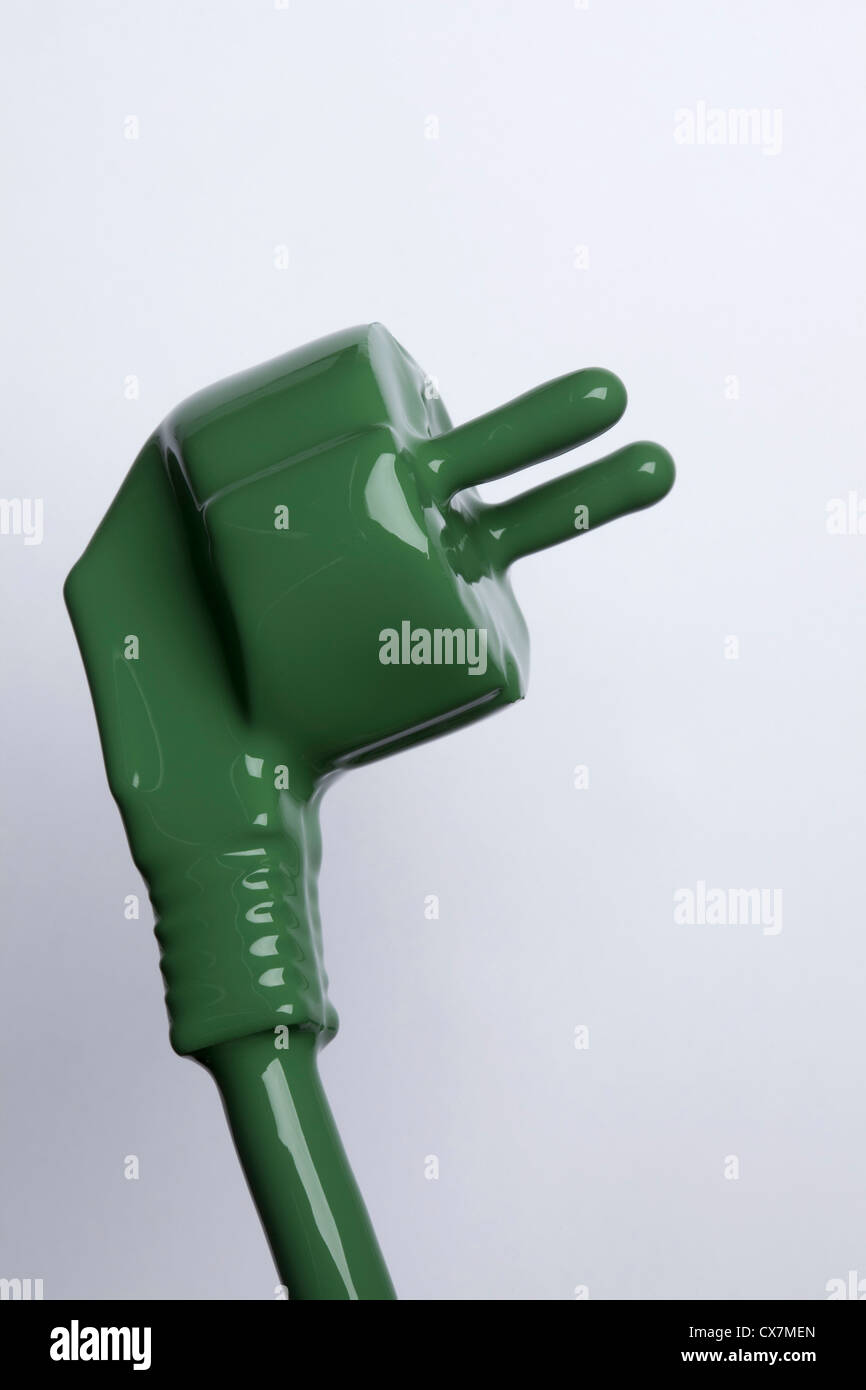 A plug and cable painted green Stock Photo