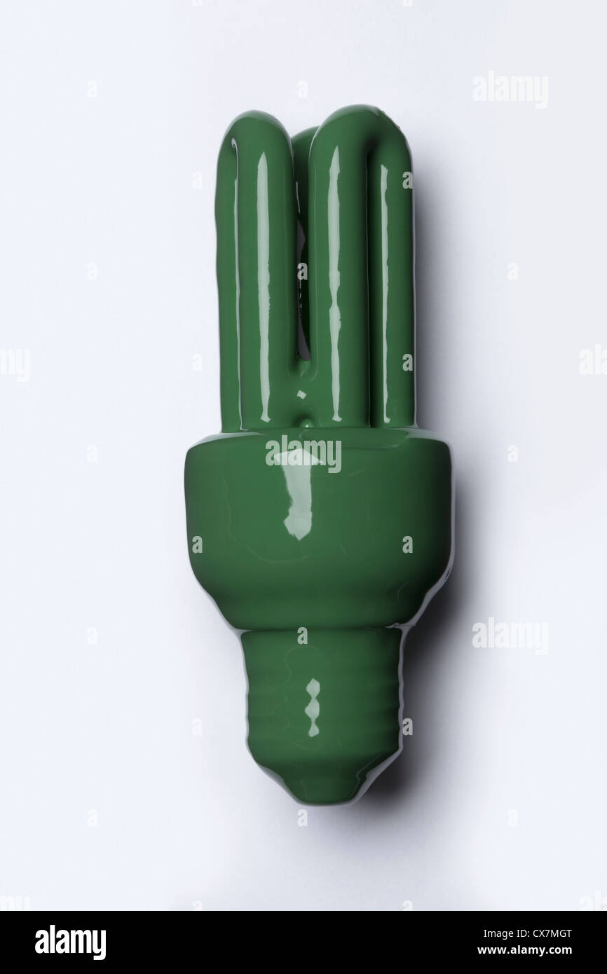 An energy efficient light bulb painted green Stock Photo - Alamy