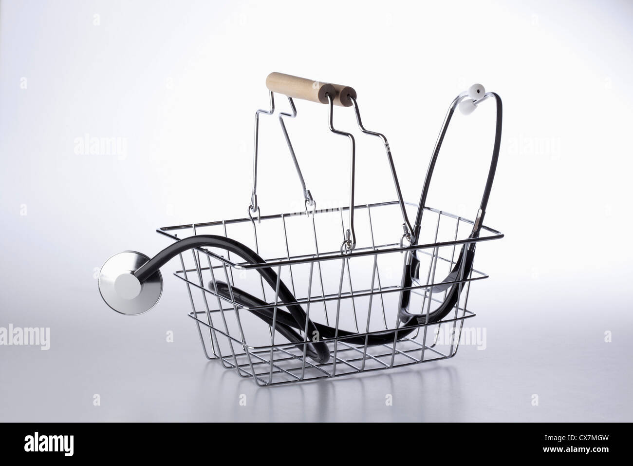 A shopping basket with a stethoscope in it Stock Photo