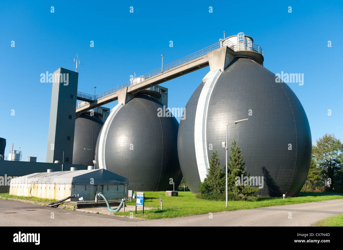 sludge digestion installation on a waste water plant. Here is methane produced and used for the energy supply for the plant Stock Photo