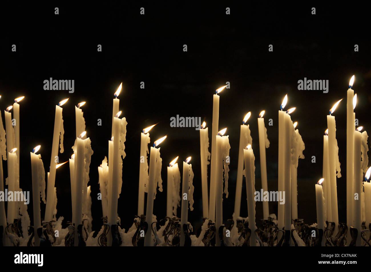 Flickering flames of candles Stock Photo Alamy