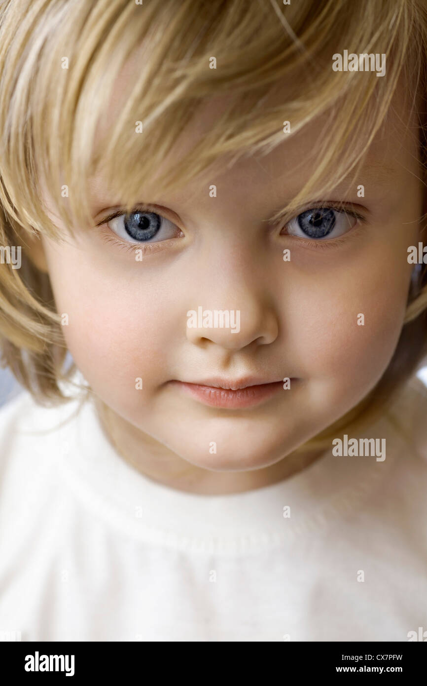 A cute little girl staring blankly Stock Photo Alamy