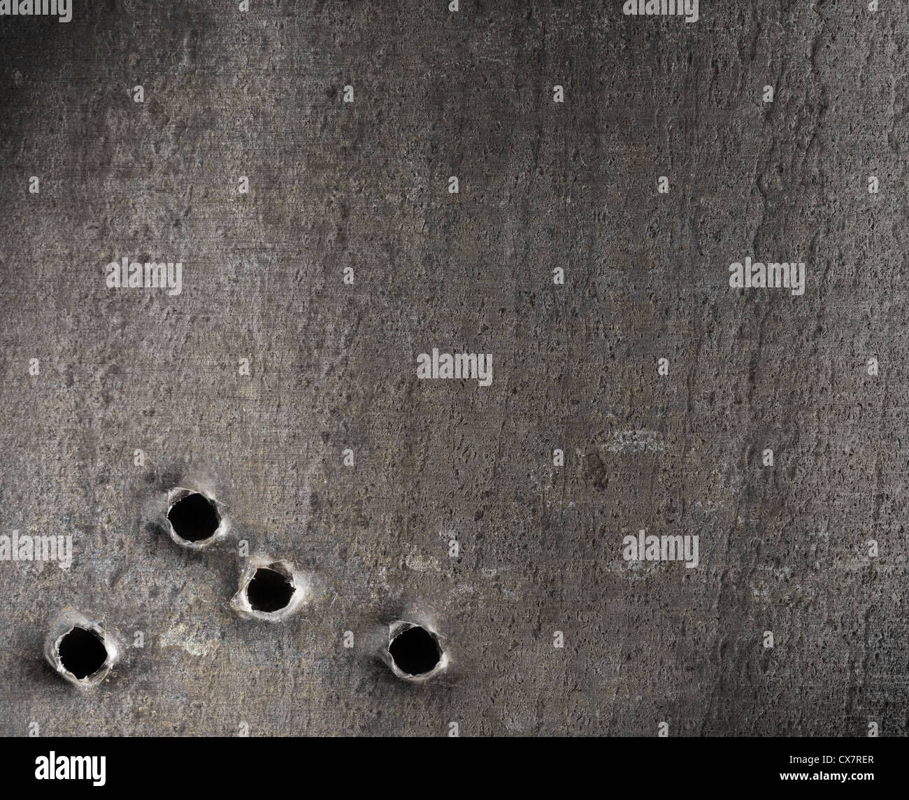 metal with bullet holes military background Stock Photo