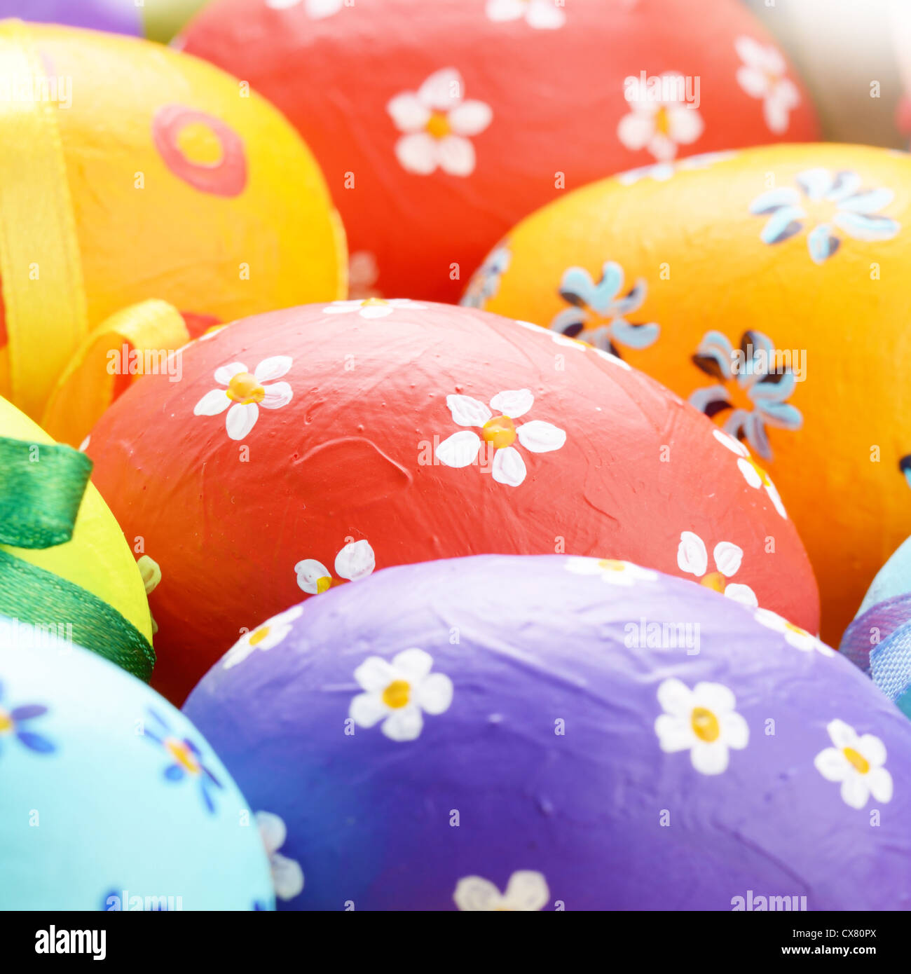 Painted easter eggs with bows background Stock Photo - Alamy