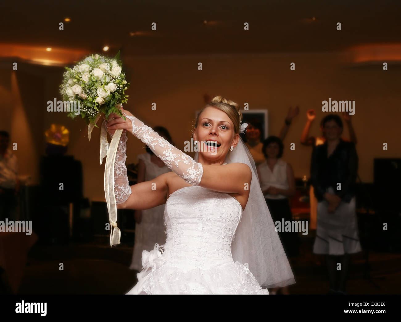 The bride throws a wedding bouquet to the girlfriends Stock Photo Alamy