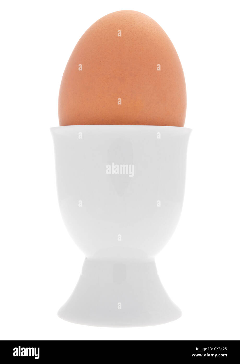 Egg in an eggcup on white background Stock Photo