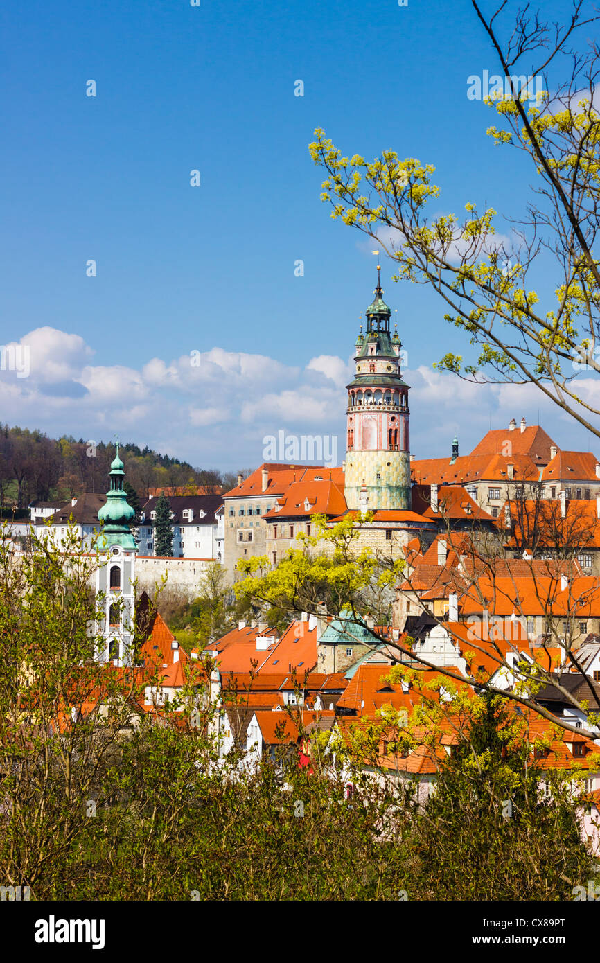 Overview of the Unesco listed town of Cesky Krumlov with trees in foreground Czech Republic Stock Photo