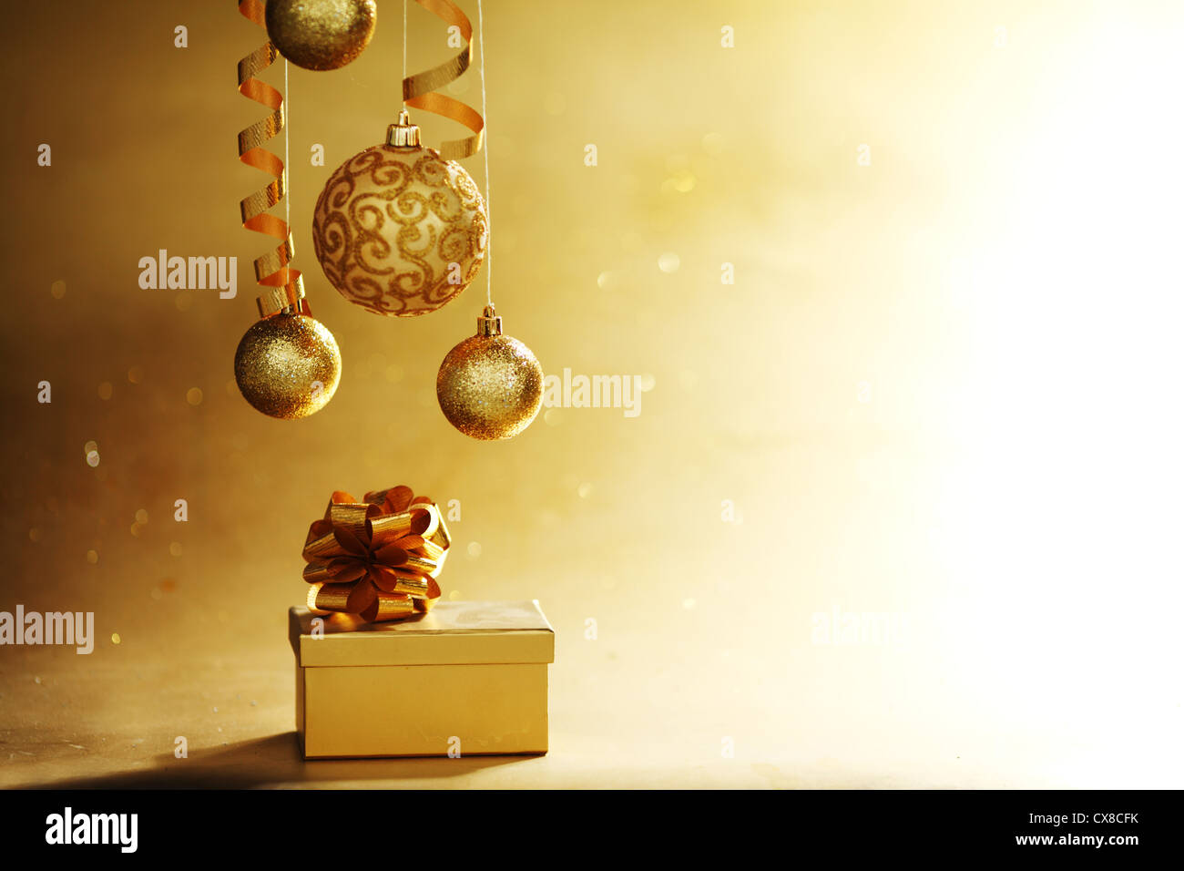 golden christmas balls on bokeh background Stock Photo - Alamy