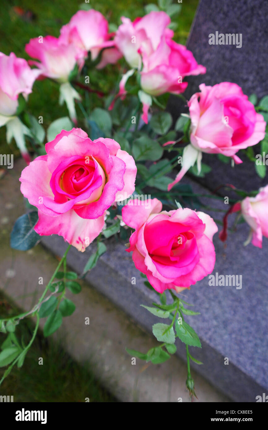 flowers on a grave in a churchyard Stock Photo Alamy