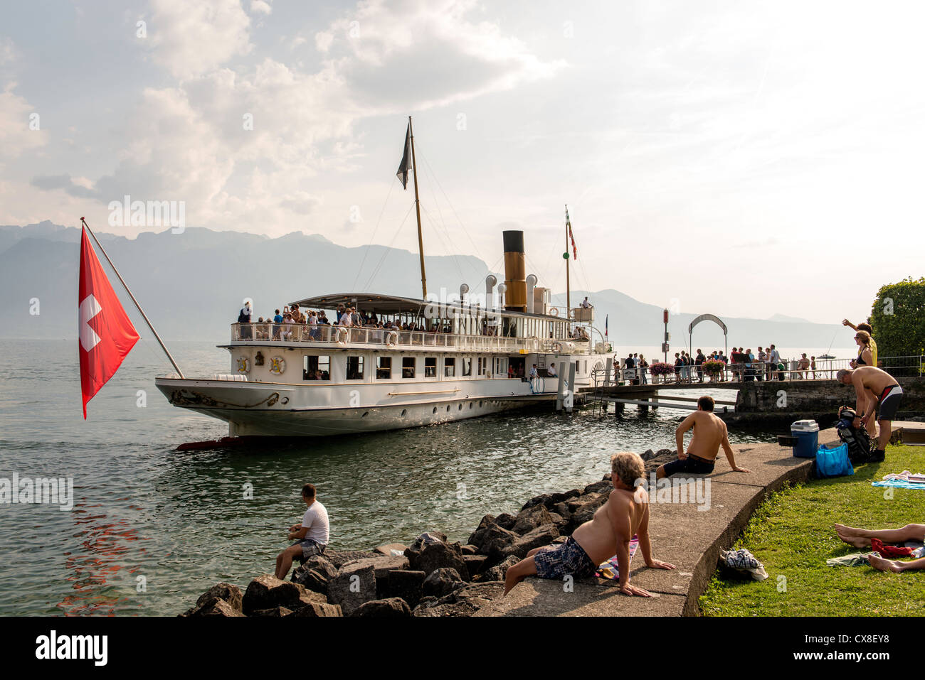 People relaxing by the Lausanne lake Switzerland Europe Stock Photo
