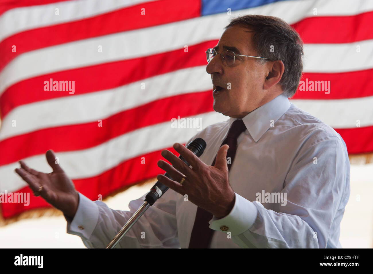 Secretary of Defense Leon E. Panetta addresses U.S. service members at Yokota Air Base, Japan, Sept. 17, 2012. Panetta is slated to travel to China and New Zealand following his visit at Yokota Stock Photo