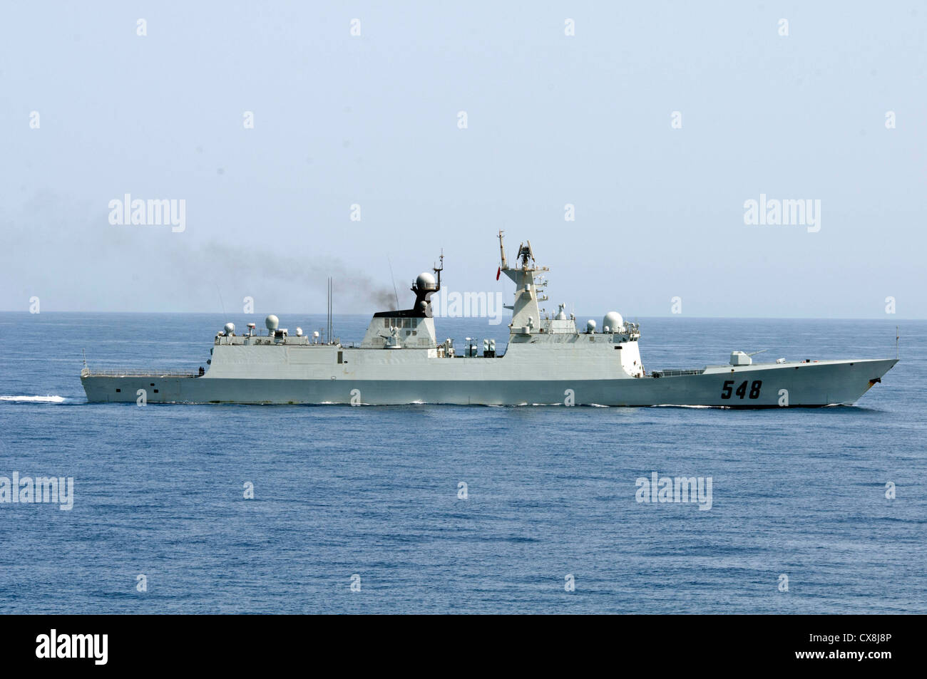 The Chinese People’s Liberation Army (Navy) frigate Yi Yang (FF 548) transits the Gulf of Aden prior to conducting a bilateral counter-piracy exercise Monday, Sept. 17, 2012 with the guided-missile destroyer USS Winston S. Churchill (DDG 81). The focus of the exercise was American and Chinese naval cooperation in detecting, boarding, and searching suspected pirated vessels. Winston S. Churchill is deployed to the U.S. 5th Fleet area of responsibility conducting maritime security operations, theater security cooperation efforts and support missions for Operation Enduring Freedom. Stock Photo