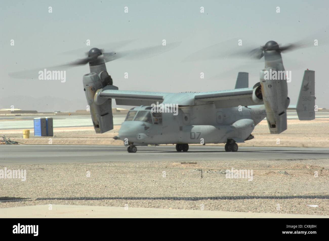 A U.S. Marine Corps MV-22 Osprey aircraft from Marine Medium Tiltrotor Squadron (VMM) 161 taxis away from a hot refueling pit at Camp Bastion, Helmand Province, Afghanistan on September 19, 2012. Stock Photo