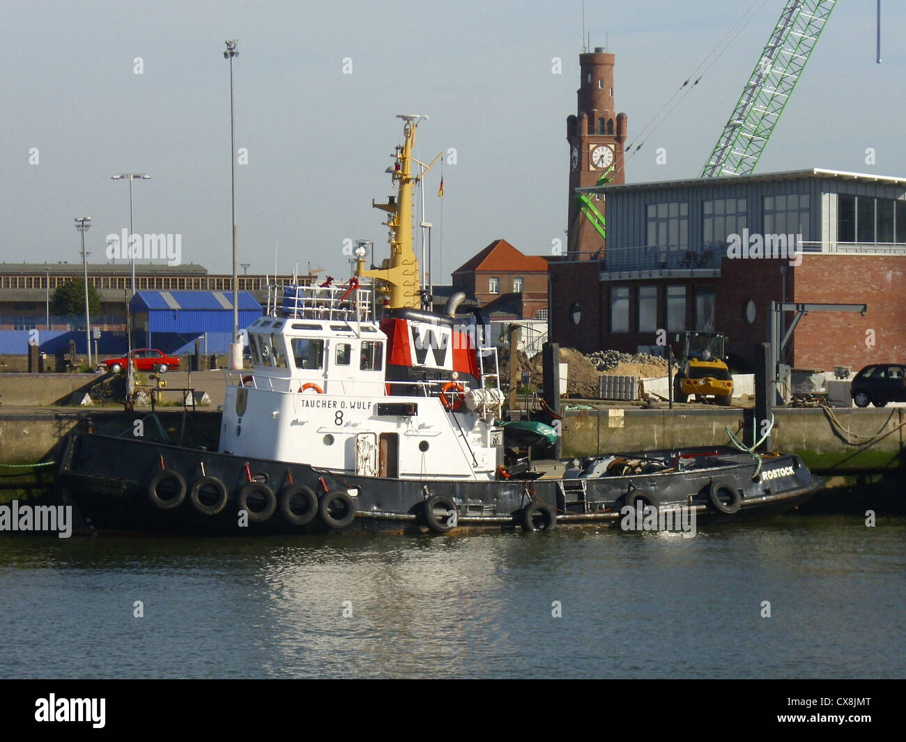 The tugboat '''Taucher O. Wulf 8''' in the port of Cuxhaven, Germany Stock Photo