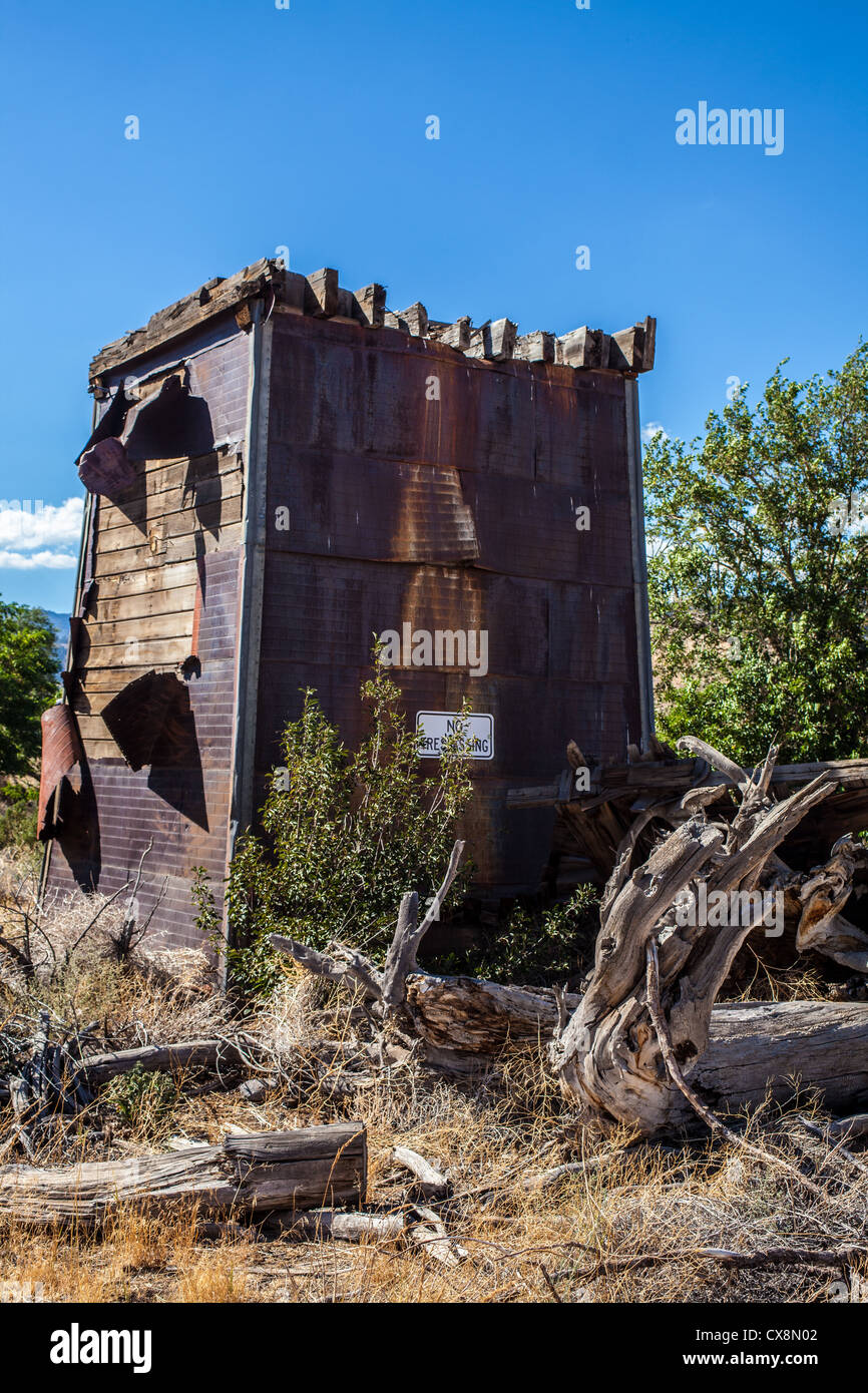 A dilapidated house and water tower at an old homestead in Reno Nevada Stock Photo Alamy